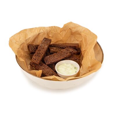 Гренки чесночные в Trattoria по цене 300 ₽