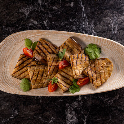 Жареные баклажаны с мягким сыром и грецким орехом в Наша хвоя по цене 480 ₽