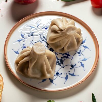 Большие хинкали с бараниной в Бакладжан по цене 320 ₽