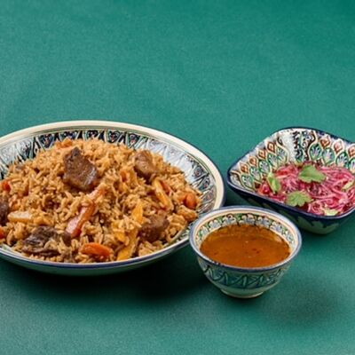 Плов с говядиной в Гриль-бар Угли по цене 1150 ₽