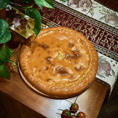 Осетинский пирог с капустой и мясом в Ресторан Кавказ по цене 650 ₽
