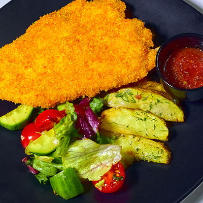 Шницель из свинины в Кафе Наше Место по цене 540 ₽