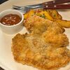 Куриное бедро в хрустящие панировке с обжаренным картофелем в Ринго Белз по цене 590