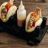 Бао тако с мягкопанцерным крабом и манго в Ikura Izakaya Nikkei по цене 2090