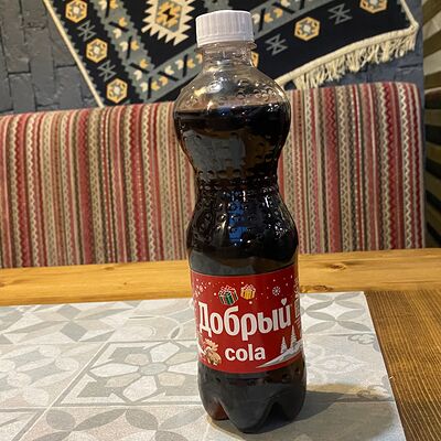 Добрый Cola в Старик Хинкалыч по цене 220 ₽