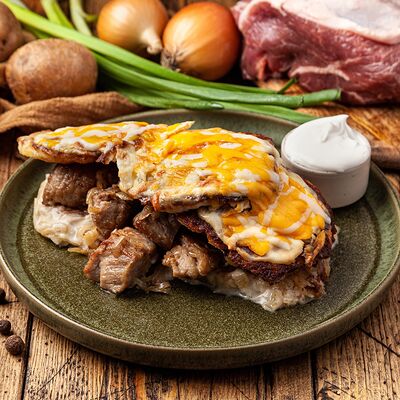 Драники томленые со свининой в Сябры по цене 650 ₽