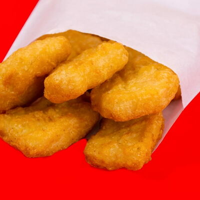 Куриные наггетсы в Камикадзе по цене 262 ₽