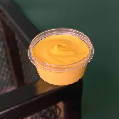 Соус сырный в Охота мясо по цене 80 ₽