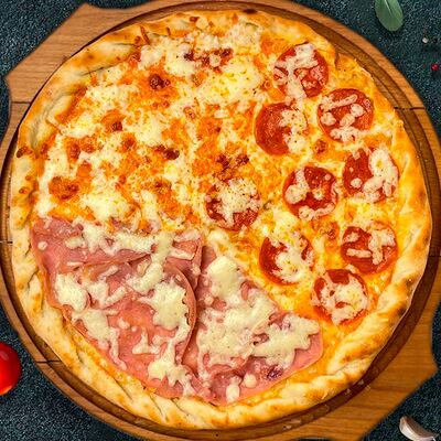 Пицца Три сезонав Pizza della Casa пиццерия по цене 619 ₽