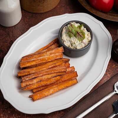 Батат фри с сырным соусом в DiDi по цене 610 ₽