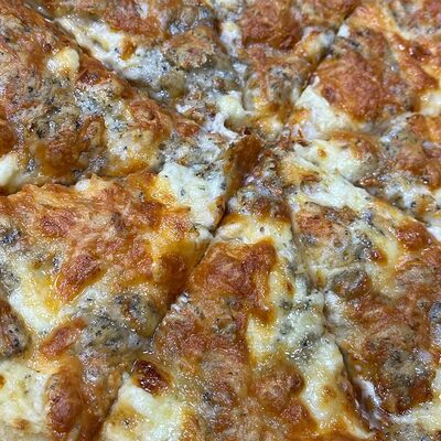 Пицца 4 сыра в Puri по цене 1200 ₽