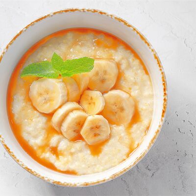 Каша пшённая с бананом и карамелью в BEERMAN&Schlitz по цене 370 ₽