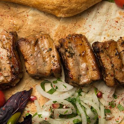 Свиные ребра в Гурман студия по цене 550 ₽