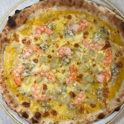 С кремом из тыквы, горгонзолой и креветками в L'angolo Italiano по цене 49 р.