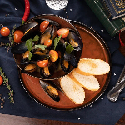 Мидии в сливочном соусе в Ирландский паб Тринити по цене 890 ₽