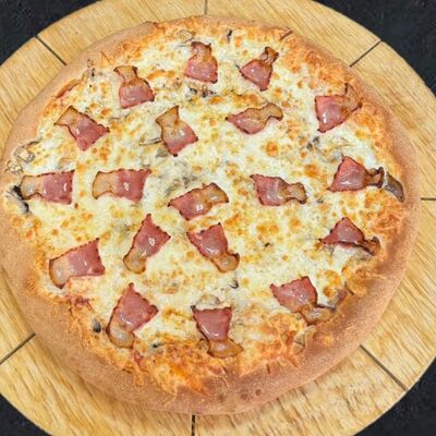 Пицца Бекон и грибы в Rimini Pizza по цене 744 ₽