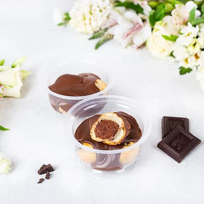 Профитроли с начинкой Шоколад в соусе с темным шоколадом в У Палыча. С пылу, с жару! по цене 431 ₽