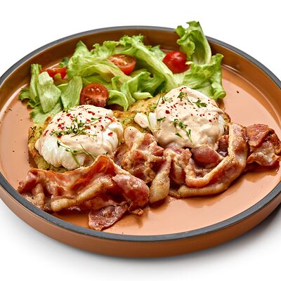 Драники с яйцом пашот и беконом в Кофейня Канело по цене 650 ₽