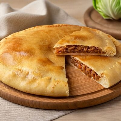 Осетинский пирог с капустой в Пироги из печи по цене 670 ₽