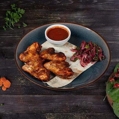 Шашлык из куриных крылышек в Ассадо по цене 440 ₽