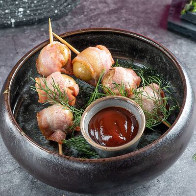 Картофельные дольки в беконе в Новые Лица по цене 480