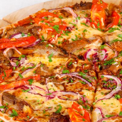 Пицца аппетитная в Мансарда по цене 800 ₽