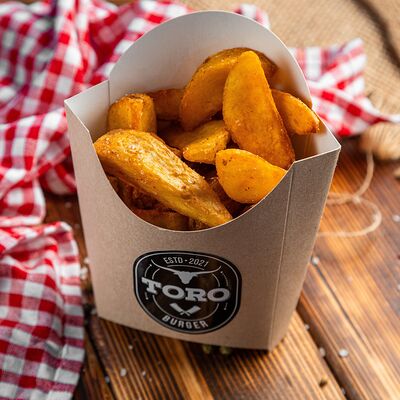 Картофель по-деревенскив Toro burger по цене 129 ₽