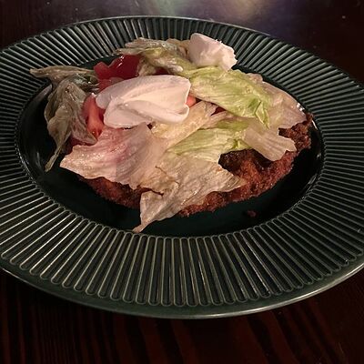 Шницель с томатами в Зеленая фея по цене 750 ₽