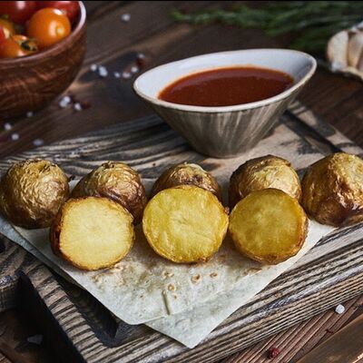 Картофель по-деревенски в Buta по цене 290 ₽