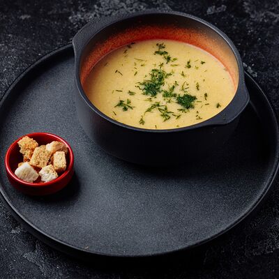 Куриный крем-суп с сухариками в Meat Feast по цене 630 ₽