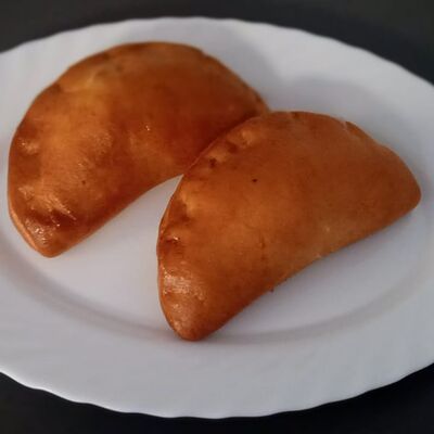 Пирог с луком и яйцом в Твой Пекарь по цене 55 ₽