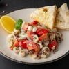 Салат с мини-кальмарами и узбекскими томатами в Сытый Лось по цене 750