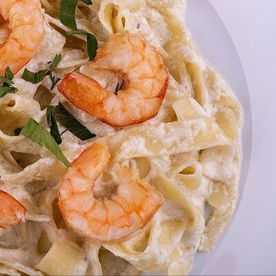 Фетучини с тигровыми креветками в сливочном соусев Panama City по цене 729 ₽