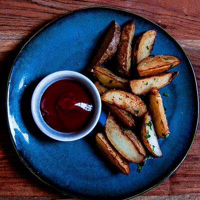 Картофель по-деревенски в Сумах по цене 265 ₽