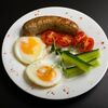 Колбаска куриная с глазуньей в Рябинушка по цене 485