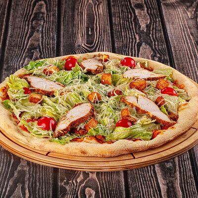 Пицца Цезарь с курицейв Осетинские Пироги по цене 900 ₽