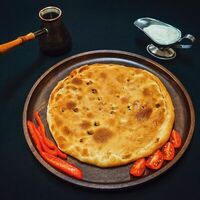 Grand Khachapuri с сыром и шпинатом №1 в Генацвале Хинкали