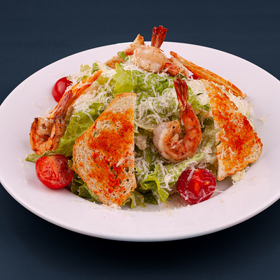 Салат Цезарь с креветкой в Дом Куксу по цене 990 ₽