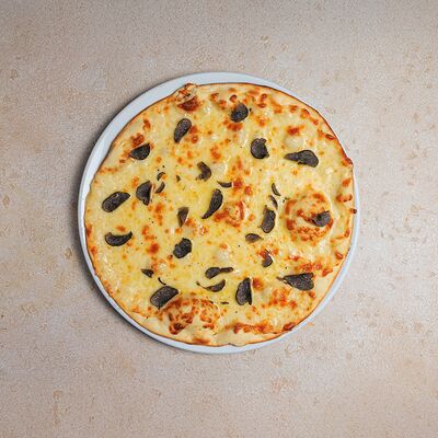 Пицца с трюфелем в Bocconcino по цене 2570 ₽