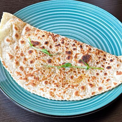 Кутаб с сыром и зеленью в Навруз по цене 190 ₽