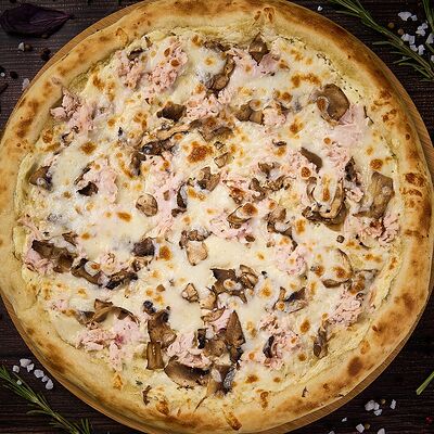 Мега сборная большая пицца в Татмак по цене 630 ₽