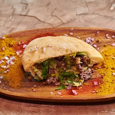 Мясо в пите с говядиной и соусом арабьята в Chipock Premium по цене 630 ₽