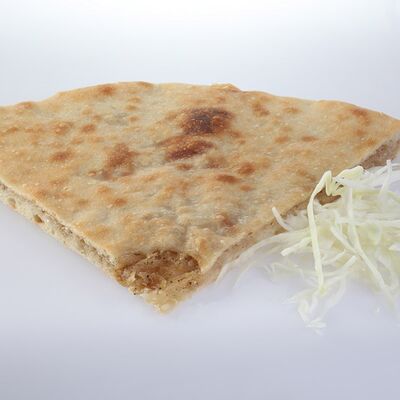 Осетинский пирог с картофелем и капустой в Осетинские пироги Виктория по цене 640 ₽