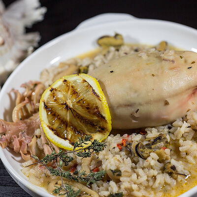 Кальмар с ризотто и морепродуктами в Il Mio по цене 750 ₽