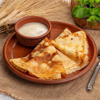 Блины со сгущёнкой в Русская кухня по цене 290 ₽