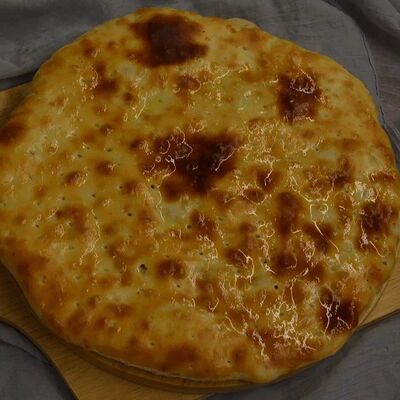 Осетинский пирог с картофелем и сыром большой в Хачапури по цене 900 ₽