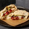 Шаурма в тандырной пите в Shawarma house по цене 450