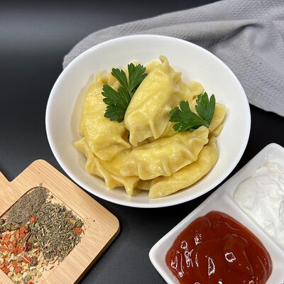 Вареники ручной лепки с картошкой в Пельмени тут по цене 339 ₽