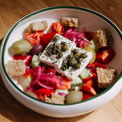 Салат Греческийв SOVA по цене 990 ₽