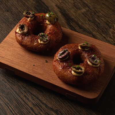 Картофельные пончики с чоризо и таджасскими оливками в Blush по цене 550 ₽